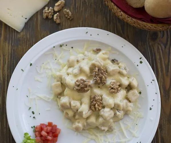 Szálloda Alma Living Hotel- Al Girarrosto